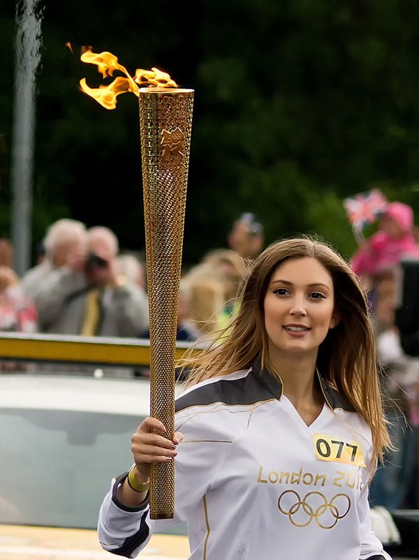 The Olympic Torch relay passes through Stoke Mandeville in Aylesbury, July 2012