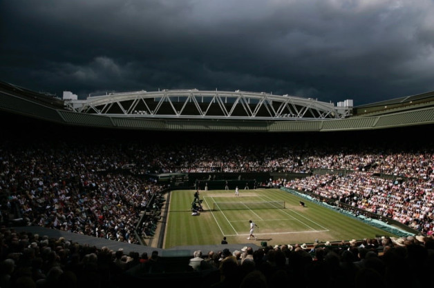 View of centre court as dark clouds gather overhead during the Men's Singles Final played between Rafael Nadal and Roger Federer during the Wimbledon Tennis Championships 2008